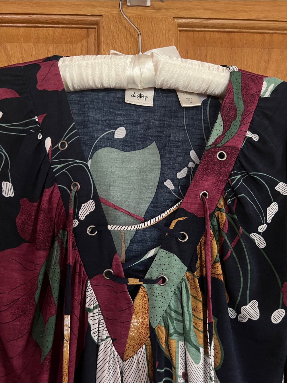 Daytrip Lace-Up Floral Long Sleeve Top in Navy, Gold, Burgundy and Green - Picture 2 of 2